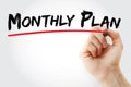 Hand writing Monthly Plan with marker, business concept