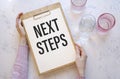 Writing Next Steps with marker, health concept background Royalty Free Stock Photo