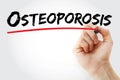 Hand writing Osteoporosis with marker, health concept