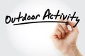 Hand writing Outdoor activity with marker Royalty Free Stock Photo