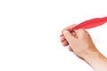 Hand writing red feather on white background Royalty Free Stock Photo