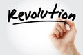 Hand writing Revolution with marker Royalty Free Stock Photo