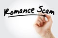 Hand writing romance scam with marker