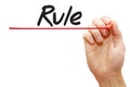 Hand writing Rule, business concept Royalty Free Stock Photo