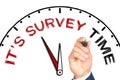 Hand writing IT S SURVEY TIME on drawn clock with marker on transparent wipe board Royalty Free Stock Photo