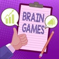Hand writing sign Brain Games. Conceptual photo psychological tactic to manipulate or intimidate with opponent Hands Royalty Free Stock Photo
