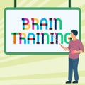 Hand writing sign Brain Training. Business approach mental activities to maintain or improve cognitive abilities