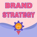 Writing displaying text Brand Strategy. Business showcase longterm plan executed for the development of a good product