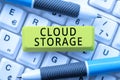 Hand writing sign Cloud Storage. Business idea computing connect devices to cloud data on remote storage Royalty Free Stock Photo