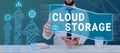 Hand writing sign Cloud Storage. Word for computing connect devices to cloud data on remote storage Royalty Free Stock Photo