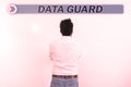 Sign displaying Data Guard. Concept meaning manage databases to survive disasters and data corruptions Royalty Free Stock Photo