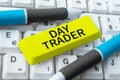 Hand writing sign Day Trader. Business concept A person that buy and sell financial instrument within the day