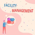 Hand writing sign Facility Management. Concept meaning maintenance of an organization s is buildings and equipment Man Royalty Free Stock Photo