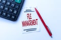 Hand writing sign File Management. Conceptual photo computer program that provides user interface to manage data Royalty Free Stock Photo
