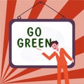 Hand writing sign Go Green. Word for making more environmentally friendly decisions as reduce recycle