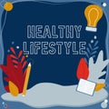 Hand writing sign Healthy Lifestyle. Business concept Live Healthy Engage in physical activity and exercise Text Frame Royalty Free Stock Photo