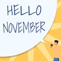 Hand writing sign Hello November. Internet Concept greeting used when welcoming the eleventh month of the year Man
