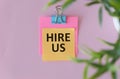 Hand writing sign Hire Us. Concept meaning Used by human resources indicate employee that he is got job Royalty Free Stock Photo