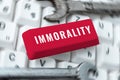 Hand writing sign Immorality. Business idea the state or quality of being immoral, wickedness Royalty Free Stock Photo