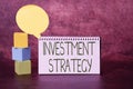 Writing displaying text Investment Strategy. Word Written on Set of Rules Procedures Behavior a Guide to an Investor Royalty Free Stock Photo