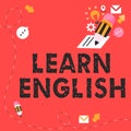 Hand writing sign Learn English. Word Written on to train writing and speaking, focusing on the global language