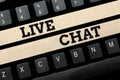 Hand writing sign Live Chat. Internet Concept talking with friend or someone through internet and PC phone Converting