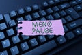 Hand writing sign Meno Pause. Word for the process through which a ceases to be fertile or menstruate Editing And