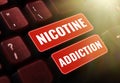 Hand writing sign Nicotine Addiction. Word Written on condition of being addicted to smoking or tobacco consuming Royalty Free Stock Photo