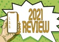 Text sign showing 2021 Review. Business approach remembering past year events main actions or good shows Displaying