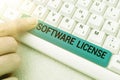 Hand writing sign Software License. Business idea legal instrument governing the redistribution of software Typing