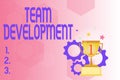 Hand writing sign Team Development. Word Written on learn why and how small groups change over time with graphs Modern Royalty Free Stock Photo