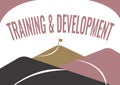 Hand writing sign Training And Development. Concept meaning Organize Additional Learning expedite Skills Mountain Range