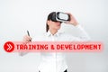 Text sign showing Traininganddevelopment. Business concept Organize Additional Learning expedite Skills