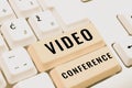 Hand writing sign Video Conference. Word for showing in remote places hold facetoface meetings Royalty Free Stock Photo