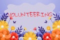 Hand writing sign Volunteering. Internet Concept Provide services for no financial gain Willingly Oblige Frame Decorated