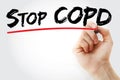 Hand writing Stop COPD with marker, health concept background