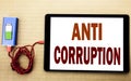 Hand writing text caption inspiration showing Anti Corruption. Business concept for Bribery Corrupt Text written on tablet laptop