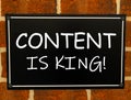 Hand writing text caption inspiration showing Content Is King concept meaning Business Marketing Online Media written on old annou Royalty Free Stock Photo