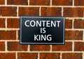 Hand writing text caption inspiration showing Content Is King concept meaning Business Marketing Online Media written on old annou Royalty Free Stock Photo