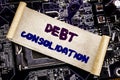 Hand writing text caption inspiration showing Debt Consolidation. Business concept for Money Loan Credit Written on sticky note, c Royalty Free Stock Photo