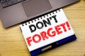Hand writing text caption inspiration showing Do Not Forget. Business concept for Reminder Message written on notebook book on the Royalty Free Stock Photo