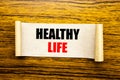 Hand writing text caption inspiration showing Healthy Life. Business concept for Good Health Food written on sticky note paper on Royalty Free Stock Photo