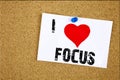 Hand writing text caption inspiration showing I Love Focus concept meaning Attention Success Concentrate Loving written on sticky