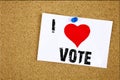 Hand writing text caption inspiration showing I Love Vote concept meaning Voting Electoral Vote Loving written on sticky note, rem