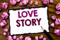 Hand writing text caption inspiration showing Love Story. Business concept for Loving Someone Heart Written on sticky note paper, Royalty Free Stock Photo