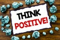 Hand writing text caption inspiration showing Think Positive. Business concept for Positivity Attitude Written on sticky note pape Royalty Free Stock Photo