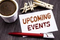 Hand writing text caption inspiration showing Upcoming Events. Business concept for Appointment Agenda List written on sticky note Royalty Free Stock Photo