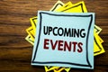 Hand writing text caption inspiration showing Upcoming Events. Business concept for Appointment Agenda List written on sticky note Royalty Free Stock Photo