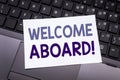 Hand writing text caption inspiration showing Welcome Aboard. Business concept for Greeting Join Member written on sticky note pap Royalty Free Stock Photo