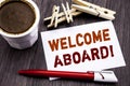 Hand writing text caption inspiration showing Welcome Aboard. Business concept for Greeting Join Member written on sticky note pap Royalty Free Stock Photo